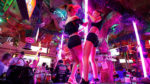 Horny Twins pole dancing at the club